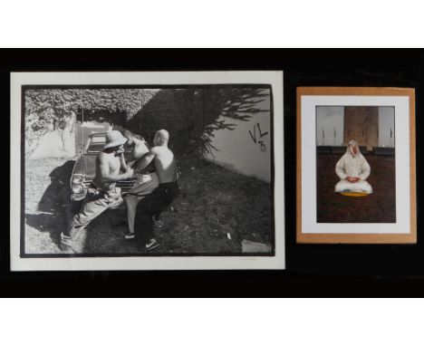 Wing Young Huie (American, b. 1966). Group of two photographs. One large silver gelatin print depicting a group of men wrestl