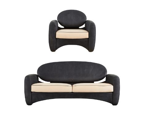 De Sede, Switzerland. Group of a contemporary chair and sofa, ca. 1990s. Dark navy suede and ivory suede with navy piping. "D