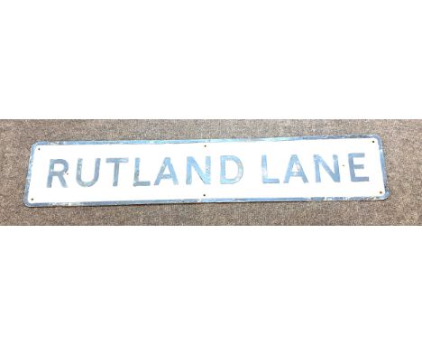 Vintage metal Rutland Lane street sign, approximate measurement: Height 9 inches Width 47 inches