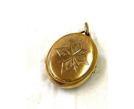 Unusual vintage triple opening gold coloured locket 