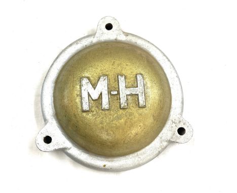 Cast Vintage M H (Massey Harris) possibly cover, approximate measurements: 9 inches diameter