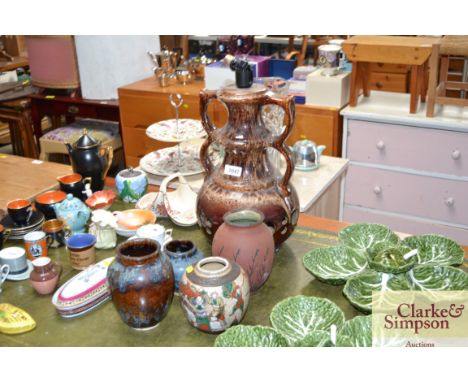 A studio pottery glazed table lamp and four vases 