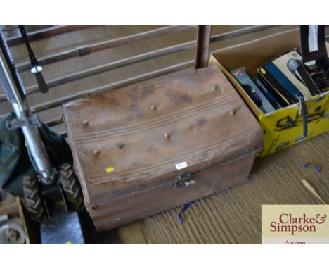 A metal storage trunk