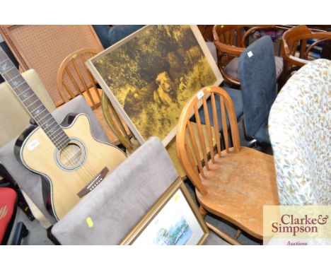 A set of four stick back dining chairs