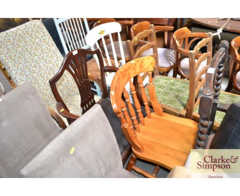 A Hepplewhite style mahogany carver chair together with a pine stick back dining chair
