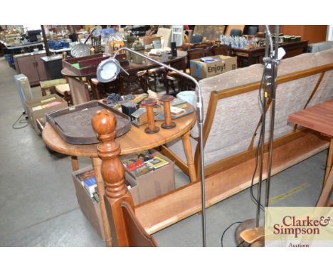 A floor standing adjustable reading lamp