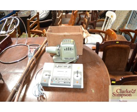A Grandstand 6000 colour console together with an Aldiss projector, sold as collector's item