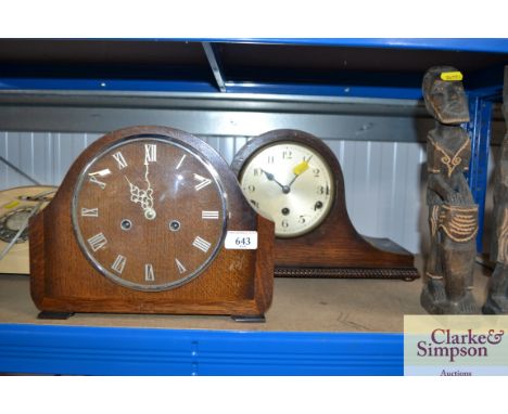 An oak cased two hole mantel clock together with an oak cased three hole mantel clock