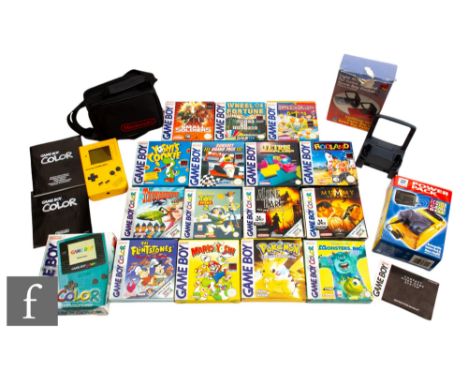 A collection of Nintendo Gameboy items, comprising a boxed Gameboy Color, an unboxed Gameboy in carry case, boxed Power Pack,