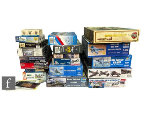 A collection of partially started plastic model kits, various scales, to include mostly aircraft examples, makers include Tru