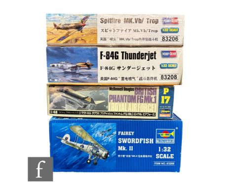 Four plastic model kits, all aircraft, to include a 1:48 scale Hasegawa Hobby Kits British Phantom FG Mk.1, two 1:32 scale Ho