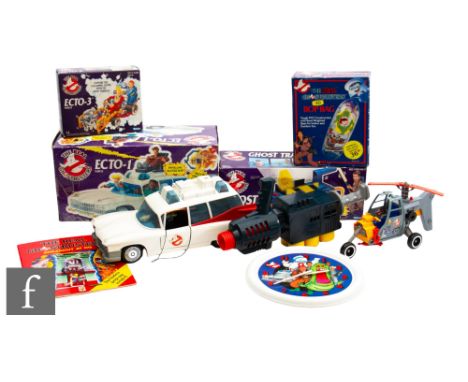 A collection of Kenner The Real Ghostbusters items, comprising a boxed ECTO-1, empty boxes for ECTO-3 and Ghost Trap, an unbo