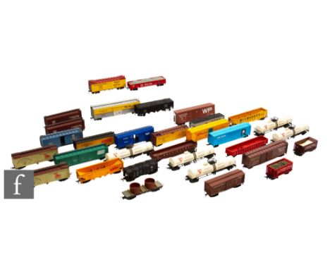 A collection of HO gauge rolling stock by Lima, Varney and similar. (32)