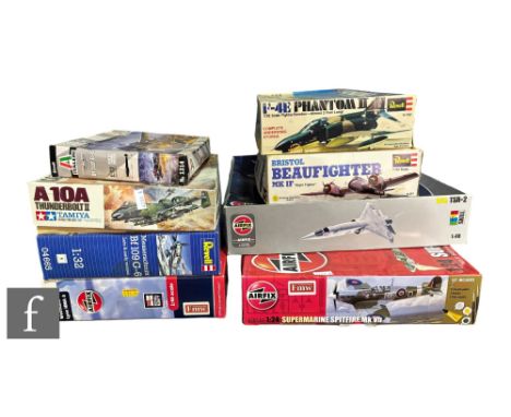 A collection of plastic model kits, all aircraft, various scales, to include Airfix A10105 BAC TSR-2, Tamiya 61028 A-10A Thun