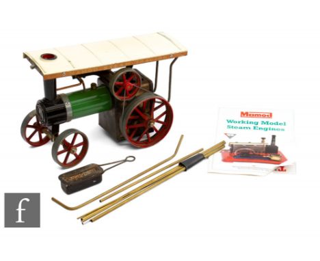 An unboxed Mamod live steam TE1A traction engine, together with a catalogue leaflet.