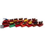 A collection of O gauge Hornby passenger coaches and rolling stock, to include lumber wagons, flat