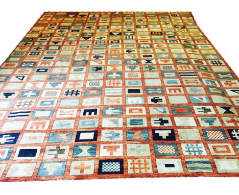 FINE UNUSUAL KAZAK CARPET, 490cm x 396cm, all over repeat geometric tiled designs.