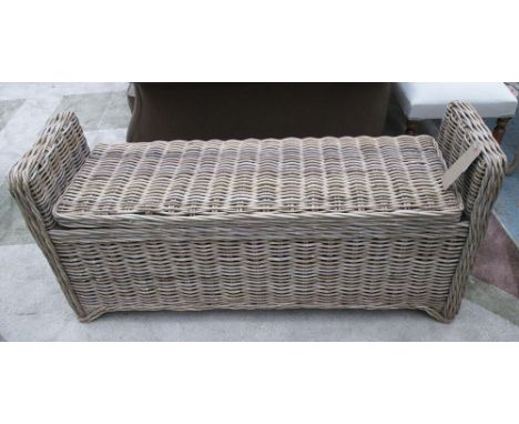 STORAGE BENCH, cane, with hinged seat, 125cm L x 40cm W x 60cm H.