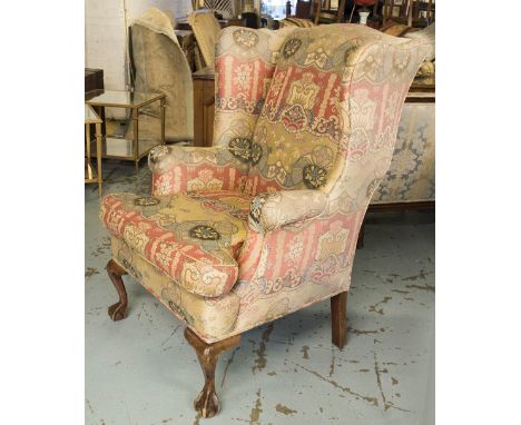 WING ARMCHAIR, Georgian style, with faded floral patterned fabric and cushion seat, 79cm W.