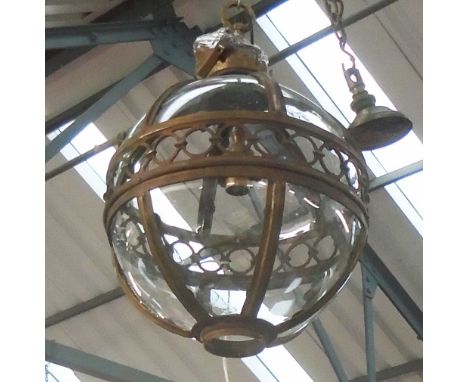 GLOBE LANTERN, in a bronzed frame, 41cm diam. plus chain.