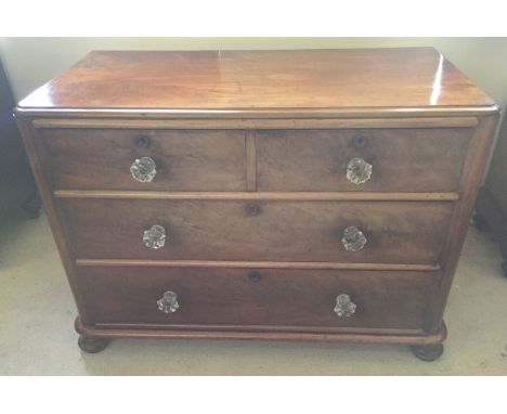 A mahogany display cabinet with ball & claw feet. Measures approx 79cm wide & 126.5cm tall.