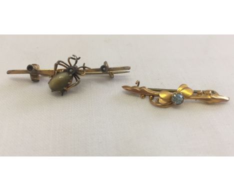 2 vintage bar brooches. One marked 9ct gold with small blue stone in pretty flower design and one with seed pearls and a spid