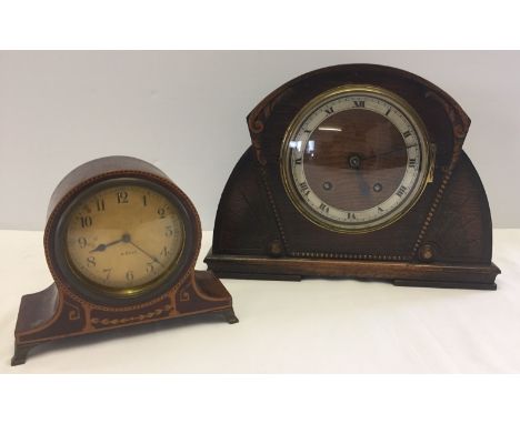 An Art Deco style wooden cased mantle clock with pendulum together with a small wooden inlaid mantle clock.