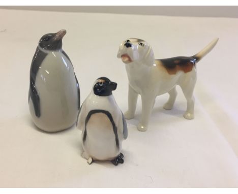 3 small ceramic animals, a Beswick fox hound, a Royal Copenhagen Penguin and a Royal Doulton penguin a/f.