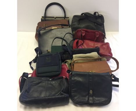 A quantity of vintage and modern ladies handbags to include Nica and Jane Shilton.
