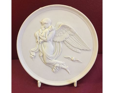 A ceramic wall plaque depicting an angel made by Royal Copenhagen, Denmark.