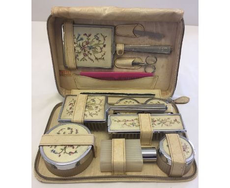 Vintage c.1950's ladies vanity case made by Two-Tix in luxan hide.  Contains brushes, pots, mirror and manicure equipment dec