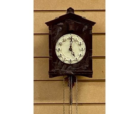 MAJAK CUCKOO CLOCK, made in USSR, brown Bakelite front moulded with pinecones, cream dial with Arabic numerals in relief, pin