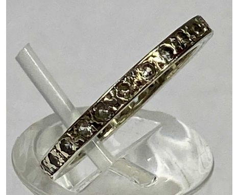 9CT WHITE GOLD ETERNITY RING set with clear stones, size M, 2.5gmsProvenance: private collection Wirral