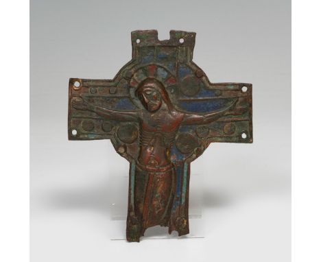 Christ crucified; Limoges workshops, 12th-13th century.Copper.With losses and cracks.Remains of enamel.Measurements: 13.3 x 1