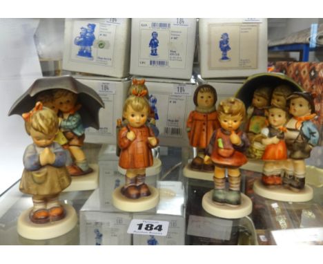 Goebel, Hummel, a collection of eight figures including Hummel Club exclusive, all boxed, list available, circa 1990's.