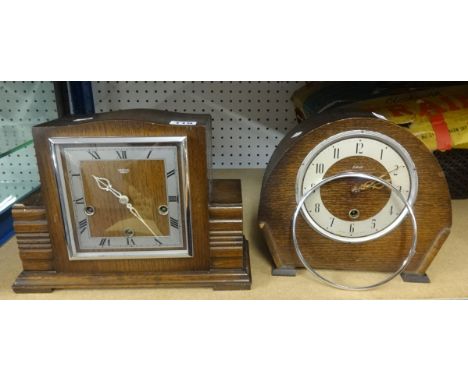 A Smiths, Enfield, chiming mantel clock, in oak case, together with another (2).