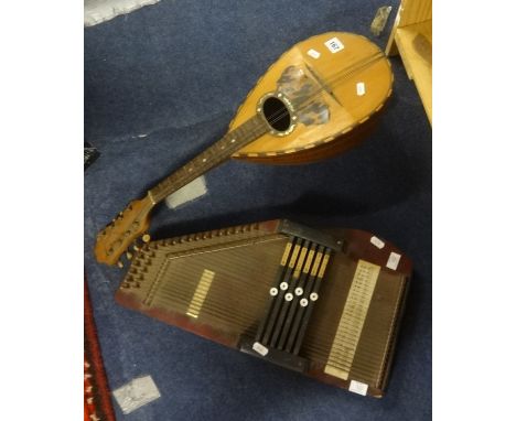A vintage mandolin and a auto harp (2).