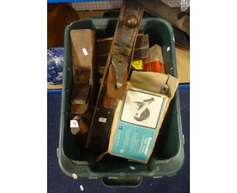 A collection of old woodworking tools, including Stanley planes, jack planes, moulding planes, trailer winch etc.