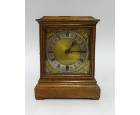 An oak bracket clock, the movement signed 'W &amp; D', with a gilt dial, height 23cm.