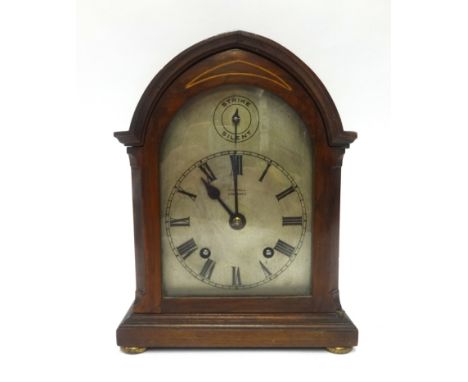 A early 20th Century walnut cased bracket clock inscribed 'Michell, Penzance', height 25cm.