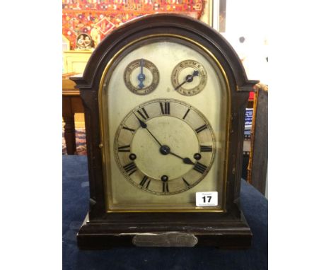 A early 20th Century bracket clock with striking and chiming movement on gongs with presentation plaque to front, height 33cm