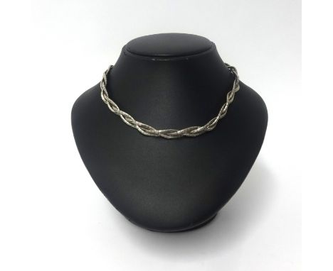 An Italian contemporary silver necklace, three strand of textured design, approx 44.7gms also a silver cornelian style pendan