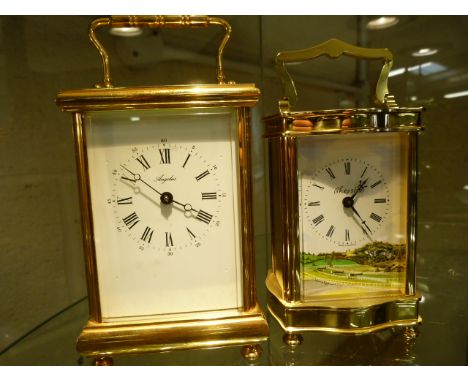 Brass Cased Carriage clock by Angelus with Roman numberal Chapter ring. 11 Jewel Movement - along with one other 