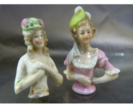 Two Tea Cosy embellishments of ladies with hats (Porcelain c.1920's)