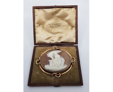 A Victorian precious yellow metal carved shell oval cameo brooch, fashioned as Leda and the Swan, (yellow metal assessed as 1