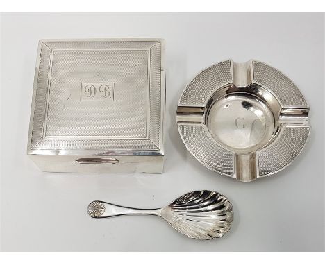 A silver caddy spoon&nbsp;by Garrard &amp; Co Ltd, assayed Birmingham 1991, together with a small silver engine turned cigare