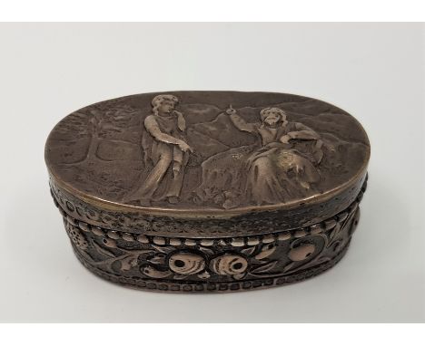 A small Victorian oval silver snuff box, import assayed London 1887, sponsors mark for Thomas Glaser, with pictorial embossed