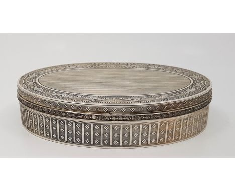 An early 20th century French silver oval box, hallmarked for .950 silver and stamped makers mark, having hinged lid decorated