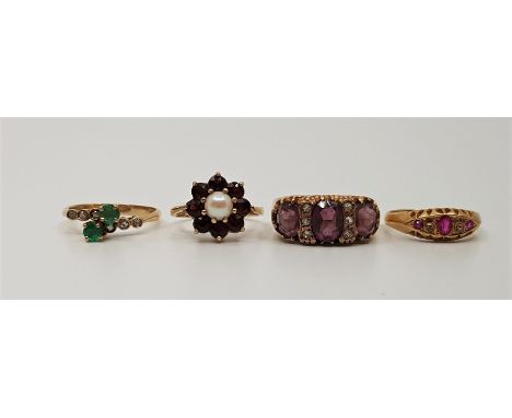 An 18ct. gold, ruby and diamond ring, (gross weight 2g), together with a 9ct. gold, emerald and diamond cross-over style ring