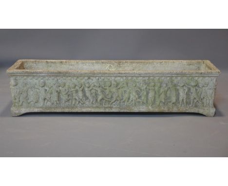 A reconstituted stone rectangular planter, the frieze decorated in relief with a continuous procession of cherubs, H.23 W.100